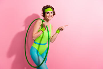 Photo of lady coach hold hula hoop demonstrate sport gym club promo with fitness exercise isolated pastel color background © deagreez