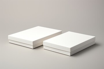 An open and a closed white magnetic cardboard box, neatly aligned on a white surface, each with an area for a blank, clear label