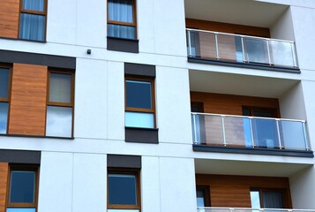 Fragment of a new modern building with balconies - obrazy, fototapety, plakaty