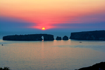 Sunset at the island of Sfaktiria near the town of Pylos in Peloponnese, Greece