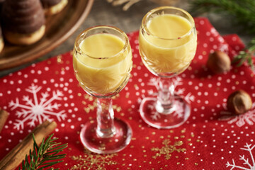 Eggnog in two glass cups made of cut glass