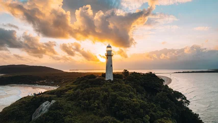 Fotobehang Ilha do Mel - Paraná. Aerial view of the Conchas lighthouse and beaches of Ilha do Mel © Thiago