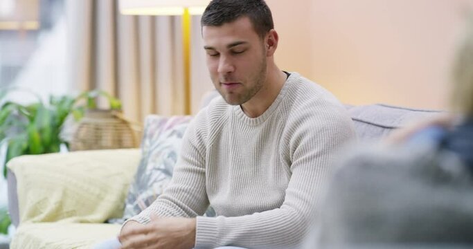 Meeting, counseling or psychology consulting for man in therapy, mental health or support on sofa. Happy client talking, psychologist listening or therapist speaking to help a lady, girl or patient