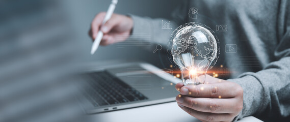 Global connecting virtual network structure concept, businessman holding light bulb with business icons, business strategy analysis, finance and banking, technology, innovation and communication.