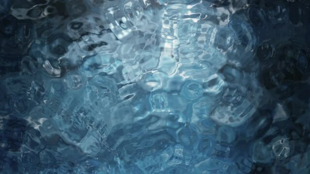 Super slow motion of water wave on light blue background. Filmed on High Speed Cinematic Camera at 1000 FPS