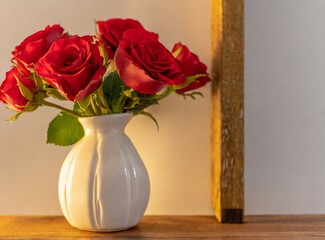 Vase with red roses