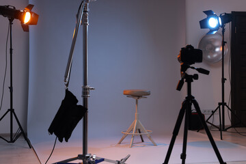 Casting call. Chair and different equipment in modern studio