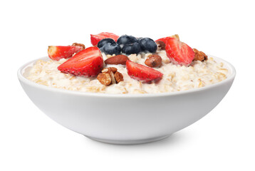 Tasty boiled oatmeal with berries and nuts in bowl isolated on white
