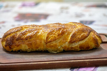 Traditional and Perfect homemade juicy Beef Wellington, tenderloin dish on rustic wooden table. Christmas food