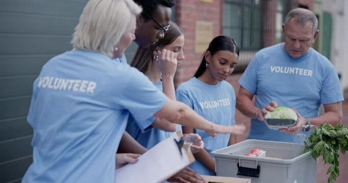Volunteer group talking, donation and people unpack grocery product, food package or vegetables for community service. Support, communication and non profit team, activist or society for city project