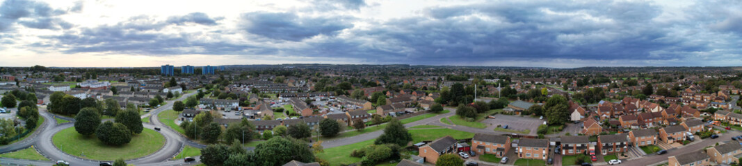 Fototapeta na wymiar High Angle Panoramic View of North Luton City of England United Kingdom During Cloudy Sunset. October 4th, 2023