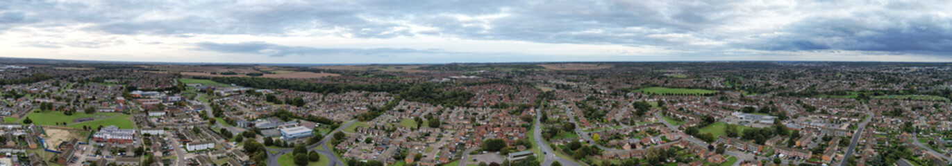 Fototapeta na wymiar High Angle Panoramic View of North Luton City of England United Kingdom During Cloudy Sunset. October 4th, 2023