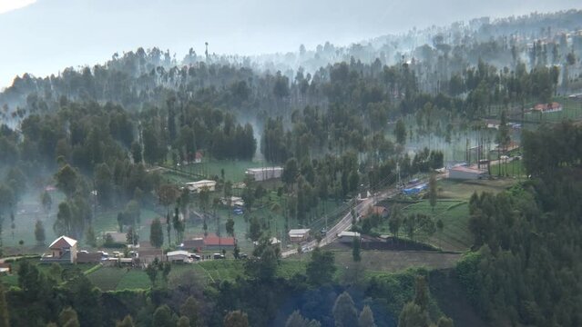 cemoro lawang misty village in the highlands of the bromo mountains aerial view