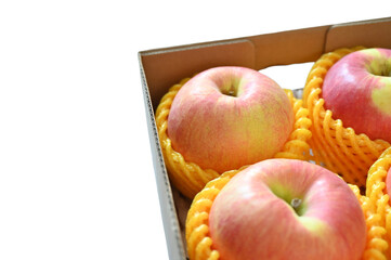 beautiful pink apple in the box on white background