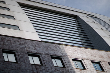 Fototapeta premium Modern Bricks and Glass , Bricks and Steel Texture on a Building