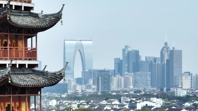 ancient tower and modern cityscape