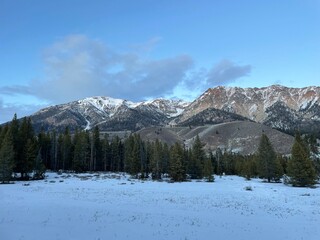 Sawtooth mountains in National forest covered in snow 