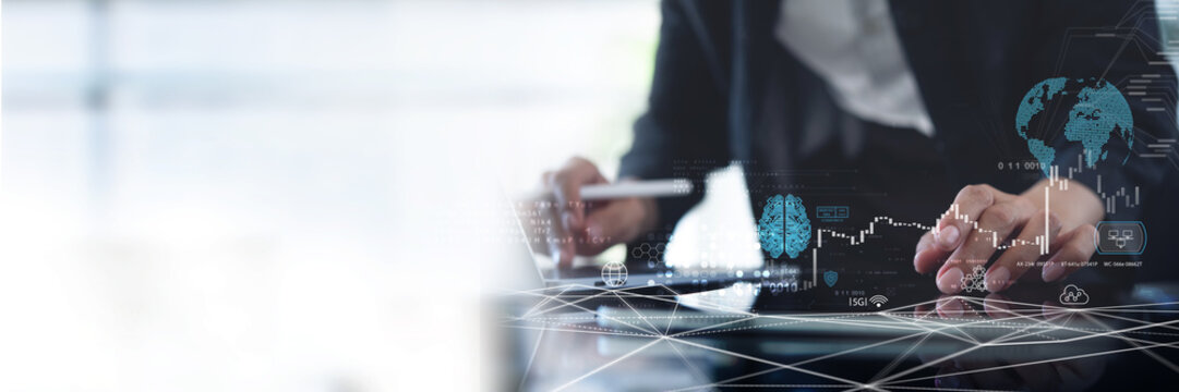 AI Artificial Intelligence, data science and management. Businessman using digital tablet with internet global network, machine learning, business intelligence