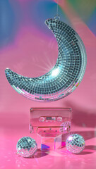 Retro Cassette Audio Music Tape Under a Disco Ball Moon on a Pastel Background