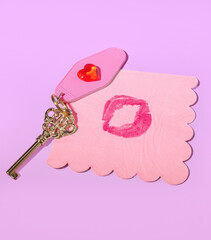 A Gold Skeleton Key with a Heart Shaped Hotel Room Tag, A Lipstick Stained Napkin, Key to Love...