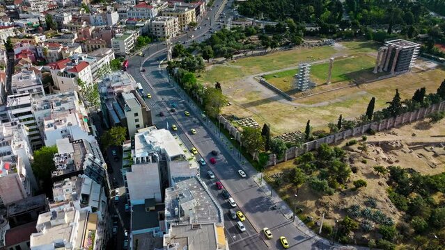 Aerial view of the Temple of Olympian Zeus, Athens National Garden and Zappeion Hall. View from above of a big historic park with exotic plants and archaeological remains, site of an ancient sanctuary