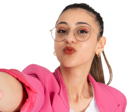 Taking selfie, young caucasian brunette businesswoman taking selfie. Sending air kiss to camera. Close up portrait. Transparent png image girl wearing formal pink jacket and glasses.