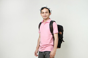 Asian man backpacker portrait. digital nomad and travelling concept. on isolated background