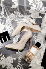 Bride's shoes and perfume bottle with mockup space