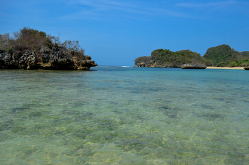 Fototapeta premium Beautiful Beach with white sand and clear skyline in Malang