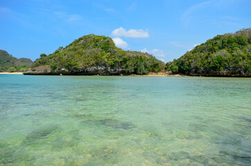 Beautiful Beach with white sand and clear skyline in Malang