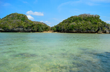 Beautiful Beach with white sand and clear skyline in Malang