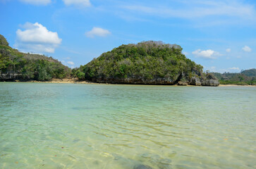 Beautiful Beach with white sand and clear skyline in Malang