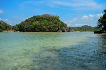 Beautiful Beach with white sand and clear skyline in Malang