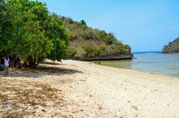 Beautiful Beach with white sand and clear skyline in Malang