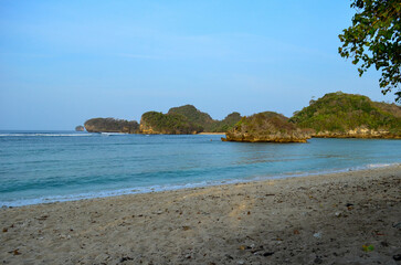 Beautiful Beach with white sand and clear skyline in Malang