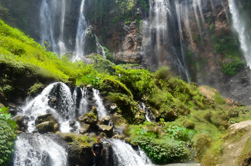 Beautiful waterfall with very beautiful scenery and shady trees