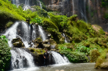 Beautiful waterfall with very beautiful scenery and shady trees