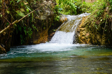 Beautiful waterfall with very beautiful scenery and shady trees