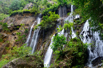 Beautiful waterfall with very beautiful scenery and shady trees