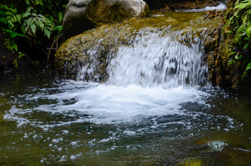 Beautiful waterfall with very beautiful scenery and shady trees