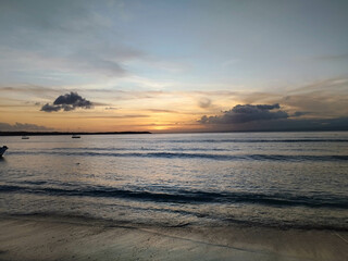 The view of the sunset in Nusa Penida is very beautiful and enchanting with an orange sky