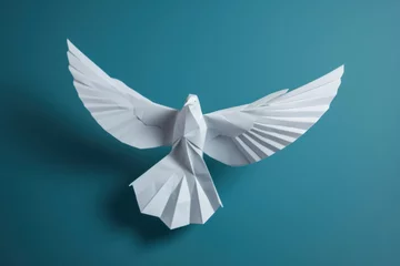 Fotobehang A white paper dove origami on a blank grey background. © tong2530