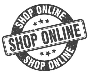 shop online stamp. shop online label. round grunge sign