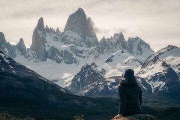 hiker in the mountains at fitz roy, patagonia