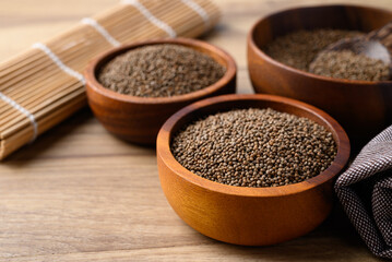 Perilla seed in wooden bowl, Healthy herbal seed ingredients in Asian food
