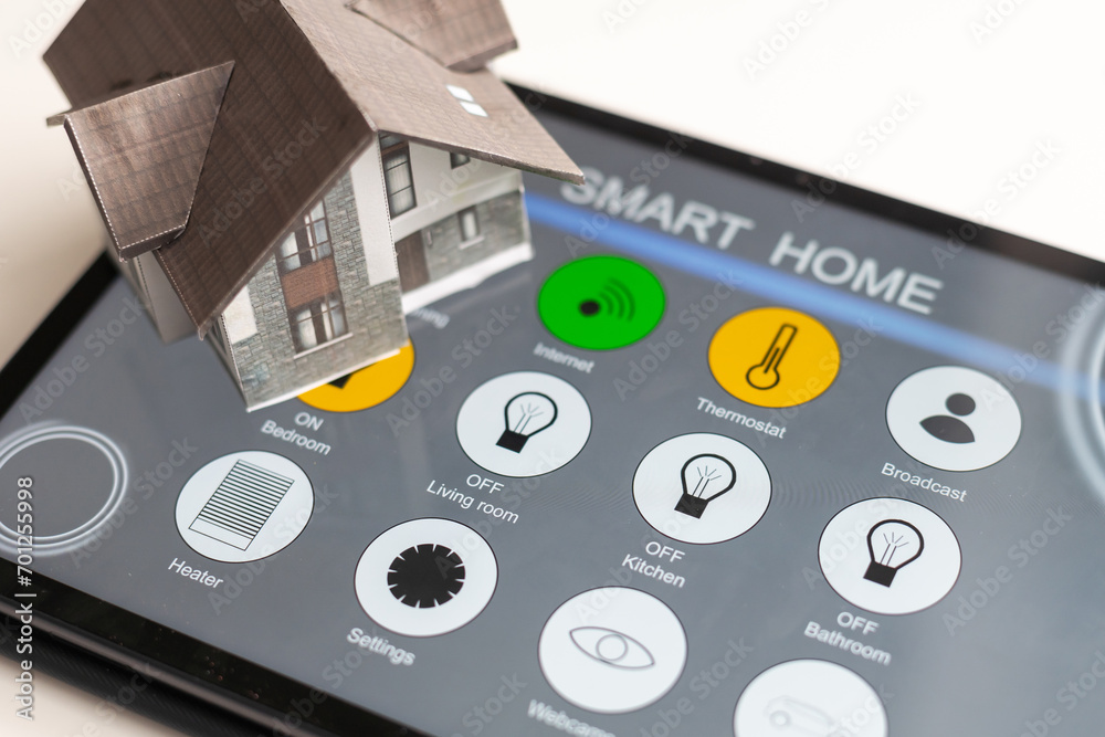 Poster small house model is on screen tablet and icons home electronics devices connecting with wireless. s