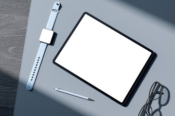 Top view of empty white tablet screen, digital watch, pen and glasses on gray wooden tablet....