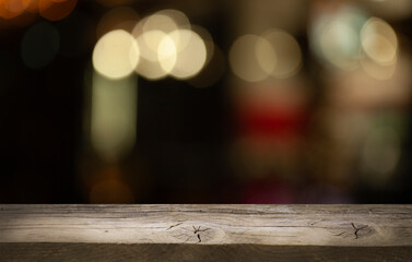image of a wooden table on a blurred bokeh background
