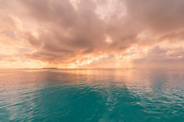 Sea ocean horizon. Skyscape with seascape. Orange gold sunset sky calm water surface, tranquil relaxing sunlight, sun rays. Inspire nature panoramic view. Meditation peaceful sunrise, dream heaven
