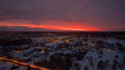 Afterglow over Dramatic Sky at Sunrise. Colorful sky at dawn with a serene and scenic landscape. Cityscape at Sunset with Beautiful Sky and Urban Landscape